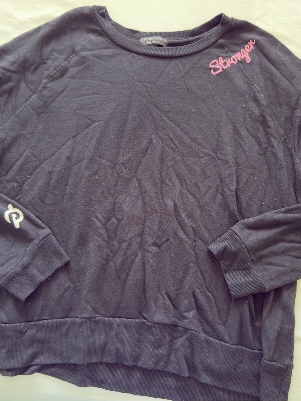Peloton x Beyond Yoga Sweatshirt with Pink "Stronger" Script